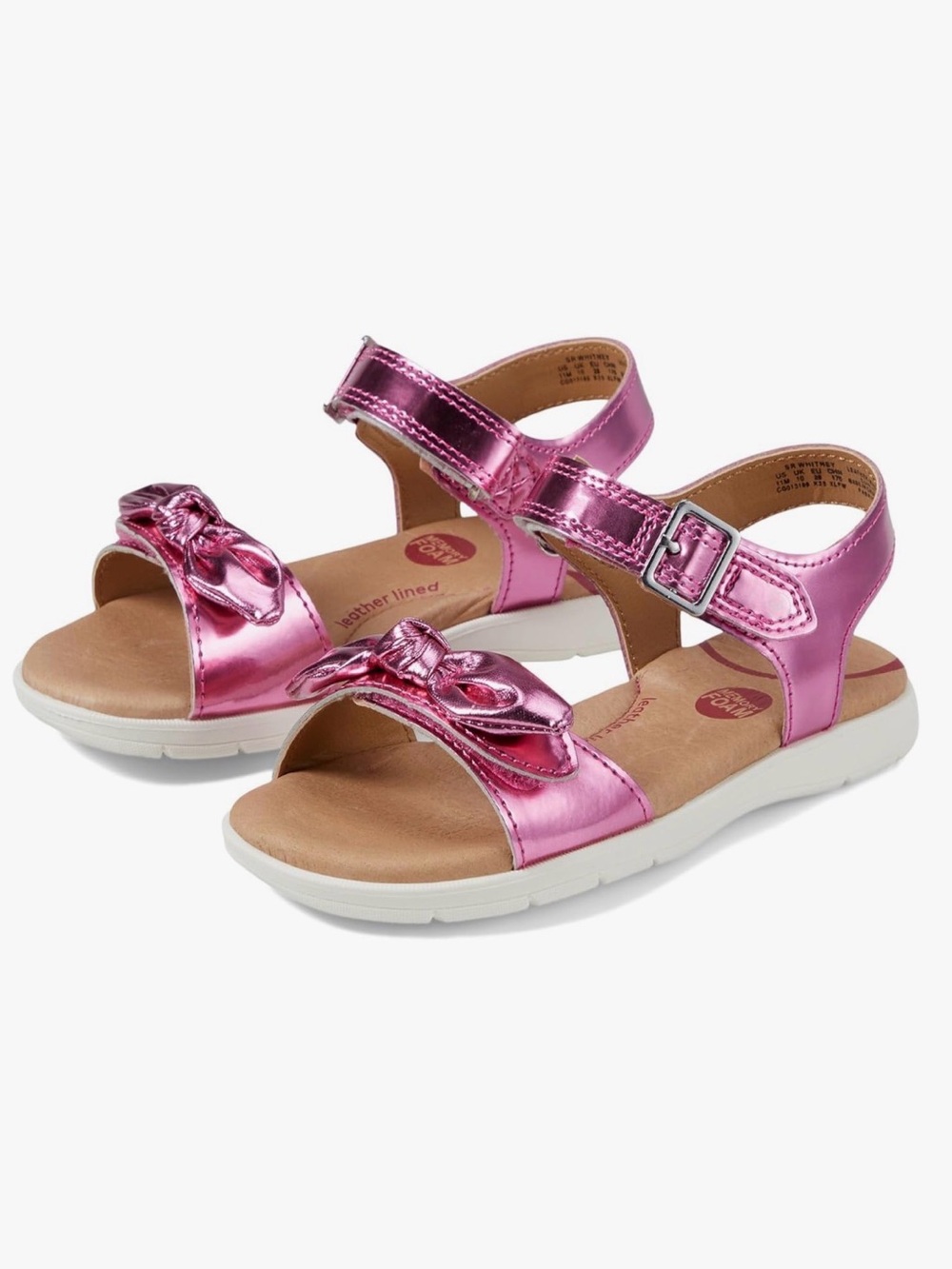 Stride Rite Whitney sandals in a glossy hot pink finish. 4M